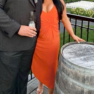 Orange ruched midi dress